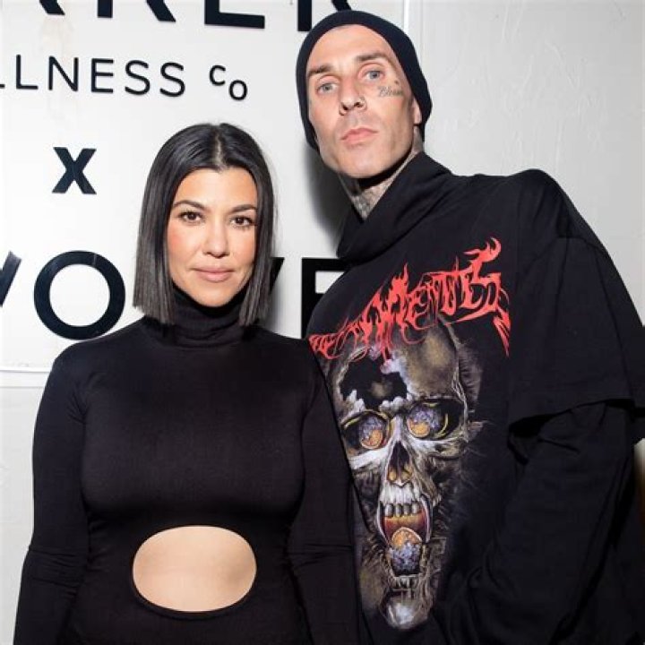 Kourtney Kardashian Rocks Plunging Tank Top & Holds Hands With Travis Barker On Outing — See Pics