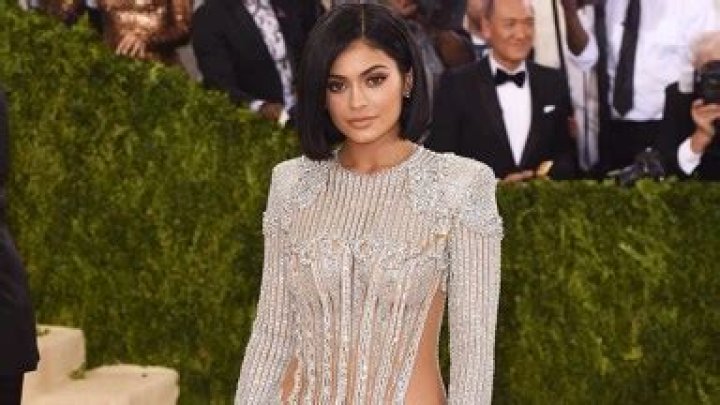 Kylie Jenner Glitters in Silver Sequin ‘Mermaid’ Dress at Paris Fashion Week